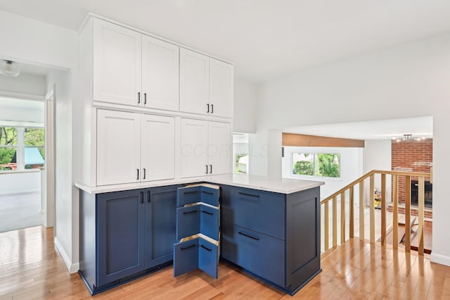 500 Cherrington Ct, Westerville, OH 43081 - kitchen with light wood-style flooring, white cabinets, and healthy amount of natural light