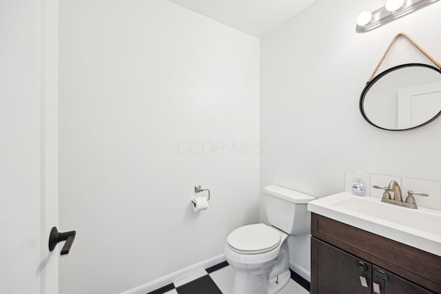 500 Cherrington Ct, Westerville, OH 43081 - half bathroom featuring baseboards, toilet, and vanity