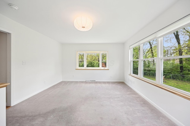500 Cherrington Ct, Westerville, OH 43081 - spare room featuring light colored carpet, baseboards, and a smoke detector