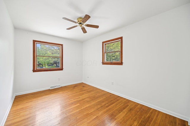 500 Cherrington Ct, Westerville, OH 43081 - empty room with plenty of natural light, baseboards, light wood-style floors, and ceiling fan