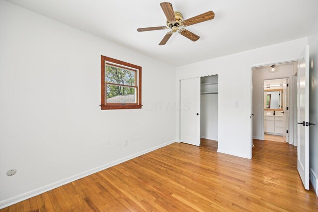 500 Cherrington Ct, Westerville, OH 43081 - unfurnished bedroom with light wood-style flooring, a closet, baseboards, and ceiling fan