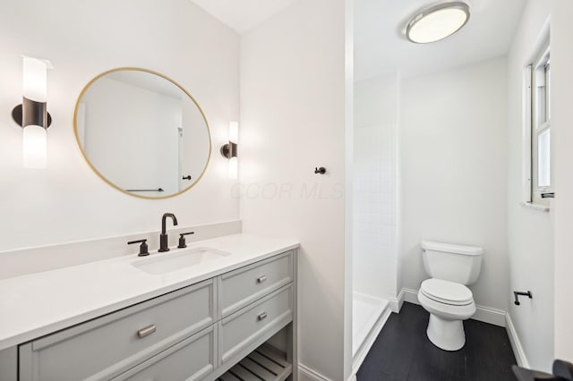 500 Cherrington Ct, Westerville, OH 43081 - full bathroom with baseboards, toilet, vanity, and a stall shower