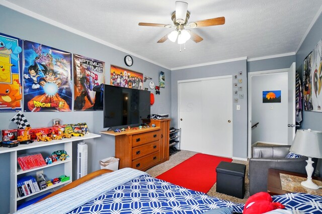 5508 Aspen Rd, Columbus, OH 43229 - bedroom featuring carpet, a closet, ceiling fan, and ornamental molding