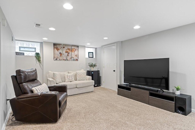 living room featuring carpet flooring and recessed lighting
