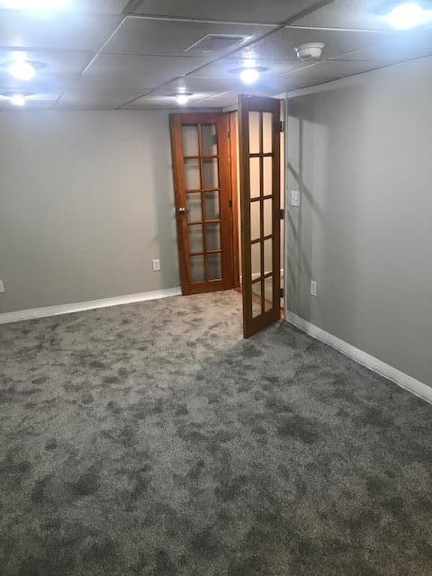 1817 Ridgebury Dr, Hilliard, OH 43026 - finished basement featuring french doors, carpet, and baseboards