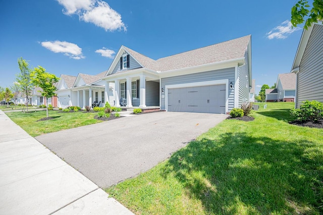 6210 Callaway Sq W, New Albany, OH 43054 - ranch-style home featuring a garage, a front lawn, asphalt driveway, and covered porch