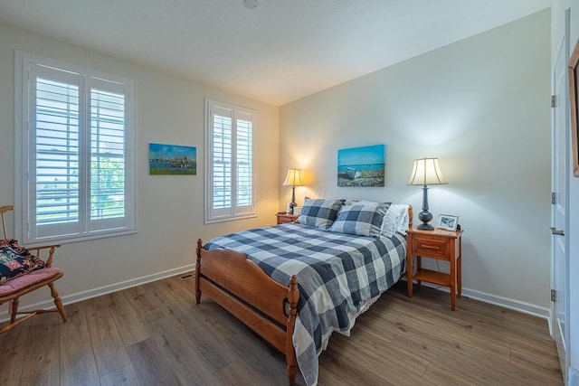 6210 Callaway Sq W, New Albany, OH 43054 - bedroom with wood finished floors and baseboards