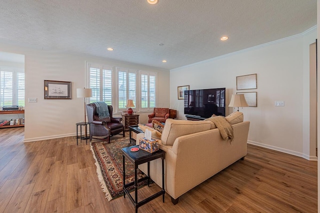 6210 Callaway Sq W, New Albany, OH 43054 - living area with a textured ceiling, wood finished floors, baseboards, recessed lighting, and crown molding