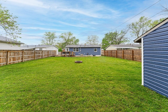 view of yard featuring a fire pit