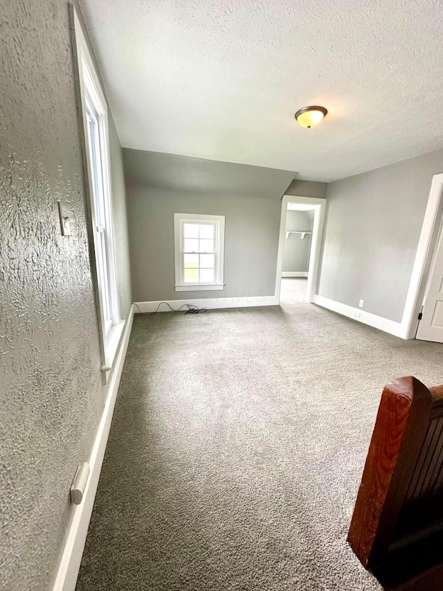 375 N Main St, Marion, OH 43302 - unfurnished bedroom featuring a textured ceiling, carpet flooring, and baseboards