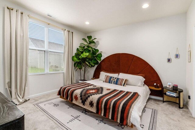 carpeted bedroom with baseboards and recessed lighting
