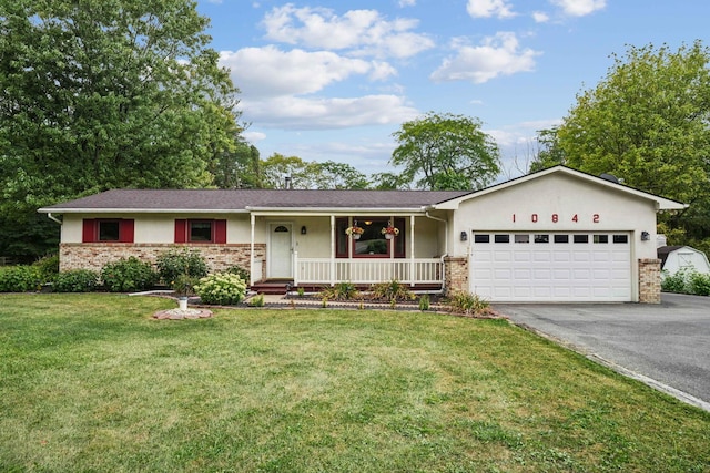 10842 Johnstown Rd, New Albany, OH 43054 - single story home with a garage, a porch, driveway, brick siding, and a front lawn