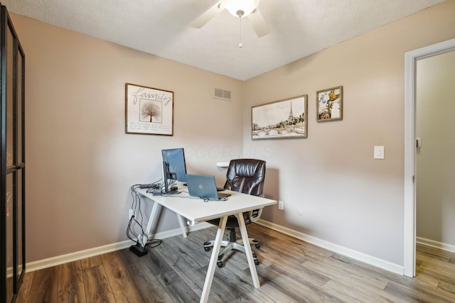 10842 Johnstown Rd, New Albany, OH 43054 - office featuring wood finished floors, ceiling fan, and baseboards