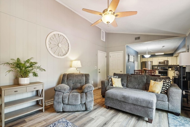 10842 Johnstown Rd, New Albany, OH 43054 - living area featuring light wood finished floors, a ceiling fan, crown molding, and high vaulted ceiling