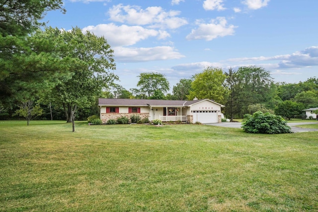 10842 Johnstown Rd, New Albany, OH 43054 - single story home with asphalt driveway, an attached garage, and a front yard
