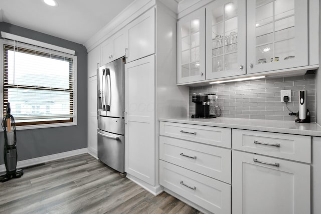10129 Granden St, Pickerington, OH 43147 - kitchen with stainless steel refrigerator with ice dispenser, backsplash, white cabinetry, light countertops, and recessed lighting