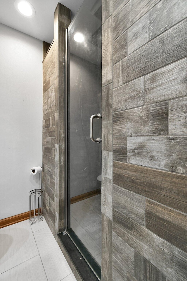 10129 Granden St, Pickerington, OH 43147 - bathroom with a shower stall and tile patterned floors