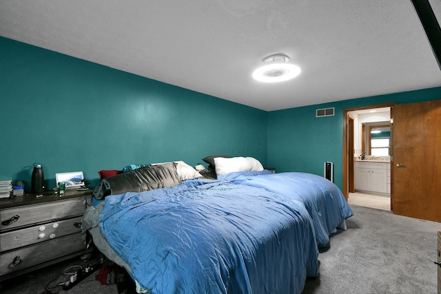 10129 Granden St, Pickerington, OH 43147 - carpeted bedroom with a textured ceiling and ensuite bath