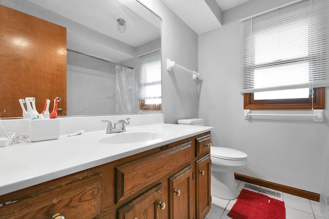 10129 Granden St, Pickerington, OH 43147 - bathroom with toilet, tile patterned floors, vanity, baseboards, and a shower with curtain