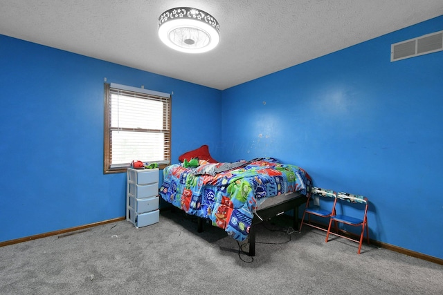 10129 Granden St, Pickerington, OH 43147 - bedroom featuring carpet floors, baseboards, and a textured ceiling