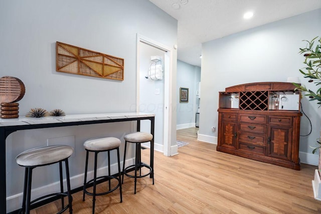 453-455 S 22nd St, Columbus, OH 43205 - indoor dry bar featuring light wood-style flooring, baseboards, and recessed lighting