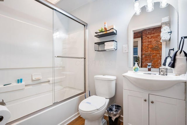 453-455 S 22nd St, Columbus, OH 43205 - full bathroom featuring toilet, vanity, enclosed tub / shower combo, and wood finished floors