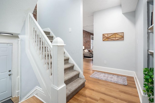 453-455 S 22nd St, Columbus, OH 43205 - stairway featuring wood finished floors and baseboards