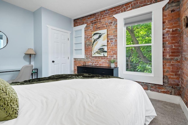 453-455 S 22nd St, Columbus, OH 43205 - bedroom featuring carpet floors, brick wall, and baseboards