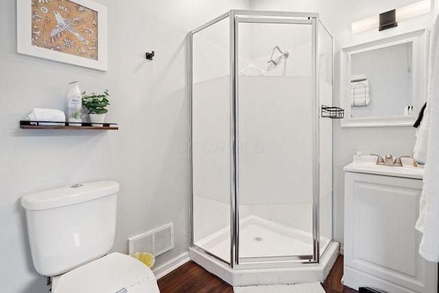 453-455 S 22nd St, Columbus, OH 43205 - full bathroom featuring a stall shower, toilet, wood finished floors, vanity, and baseboards