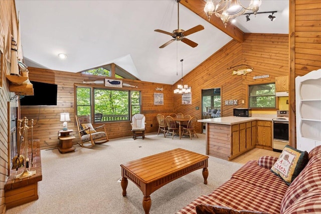 512 Natchez Ln, Sugar Grove, OH 43155 - living area featuring wood walls, a chandelier, light colored carpet, and a ceiling fan