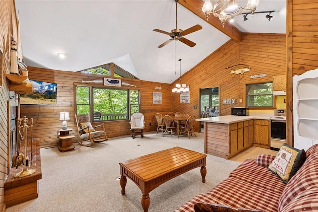 512 Natchez Ln, Sugar Grove, OH 43155 - living area with wooden walls, a chandelier, light carpet, and a ceiling fan
