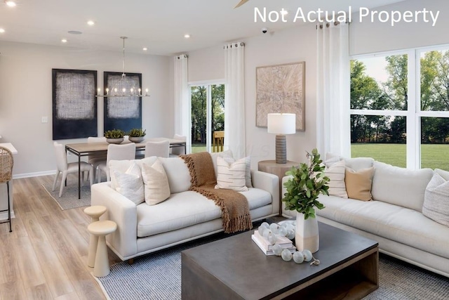 1573 Crest Dr Lot 2560, Galena, OH 43021 - living area featuring light wood finished floors, recessed lighting, a chandelier, and baseboards