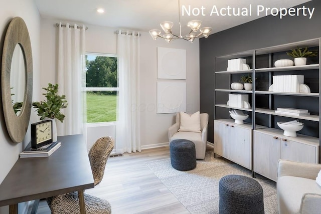 1573 Crest Dr Lot 2560, Galena, OH 43021 - office area featuring light wood-type flooring, a chandelier, and baseboards