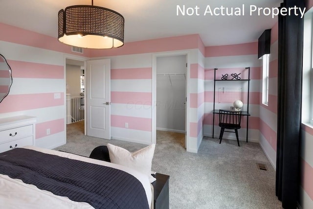1573 Crest Dr Lot 2560, Galena, OH 43021 - carpeted bedroom with a closet, baseboards, and a walk in closet
