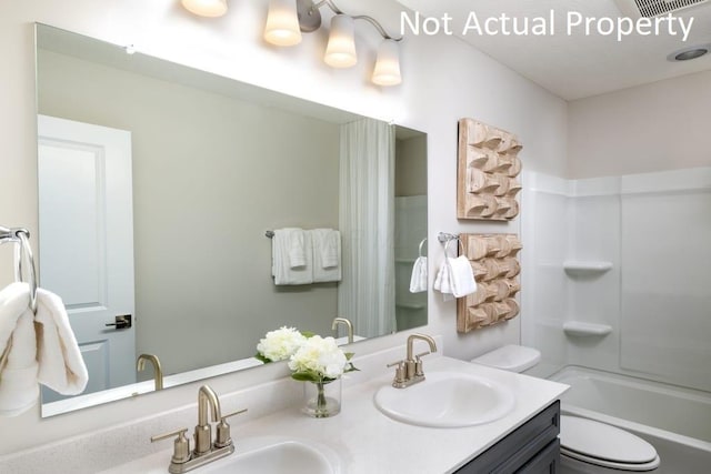1573 Crest Dr Lot 2560, Galena, OH 43021 - bathroom with toilet, double vanity, and bathing tub / shower combination