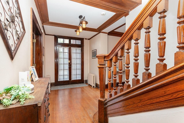 404 Rawling St, Washington Court House, OH 43160 - entryway featuring radiator heating unit, french doors, stairs, light wood-style floors, and baseboards