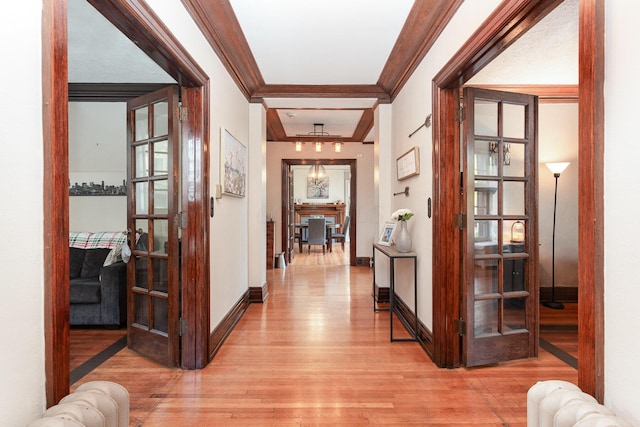 404 Rawling St, Washington Court House, OH 43160 - hall featuring crown molding, light wood finished floors, and baseboards
