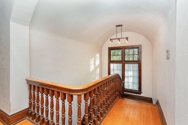 404 Rawling St, Washington Court House, OH 43160 - stairs with arched walkways, baseboards, wood finished floors, and lofted ceiling