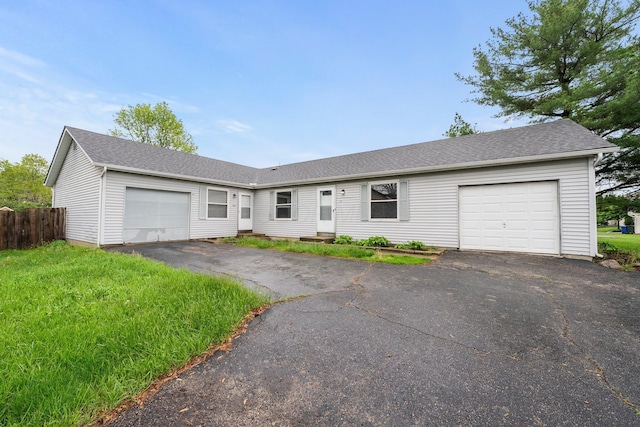 2512 Gantz Rd, Grove City, OH 43123 - ranch-style house with a garage, fence, driveway, and a shingled roof