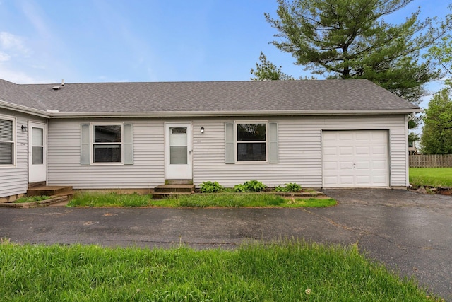 2512 Gantz Rd, Grove City, OH 43123 - view of front of property featuring a garage, asphalt driveway, and a shingled roof