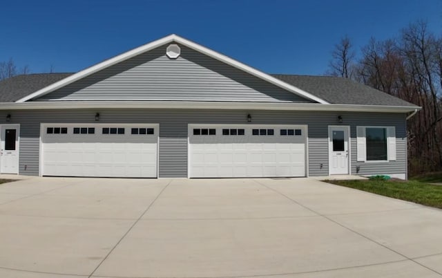 1598 Spring Village Ln, Ontario, OH 44906 - ranch-style home with an attached garage and driveway