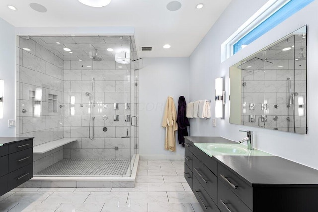 3084 Asbury Dr, Columbus, OH 43221 - bathroom featuring marble look tiles, recessed lighting, vanity, a stall shower, and baseboards