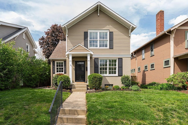1324 Haines Ave, Columbus, OH 43212 - traditional-style home featuring a front lawn and stucco siding