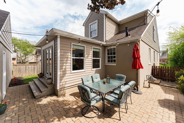 1324 Haines Ave, Columbus, OH 43212 - back of house featuring a fenced backyard, a patio area, entry steps, and outdoor dining area