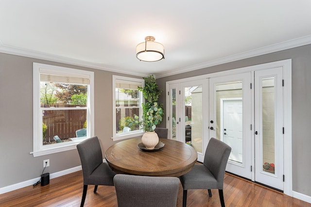 1324 Haines Ave, Columbus, OH 43212 - dining area with crown molding, baseboards, wood finished floors, and french doors