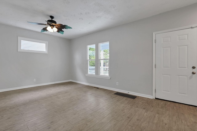 1617 Arlington Ave, Columbus, OH 43211 - empty room featuring baseboards, ceiling fan, and wood finished floors