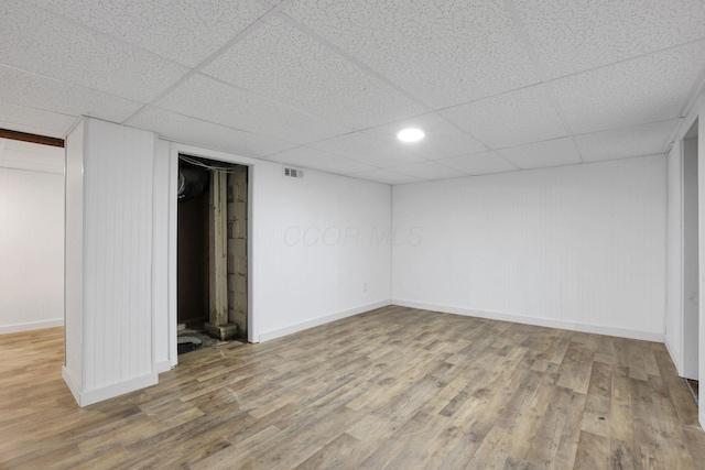 1617 Arlington Ave, Columbus, OH 43211 - finished basement featuring a paneled ceiling, wood finished floors, baseboards, and recessed lighting