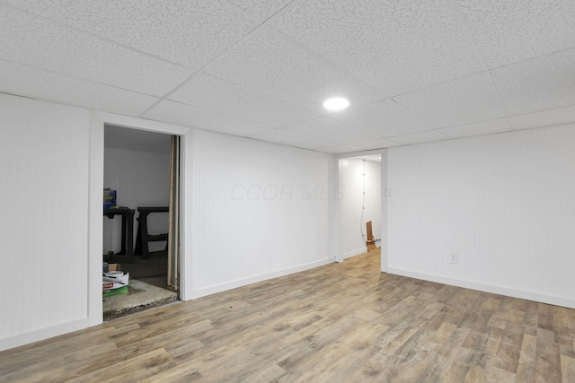 1617 Arlington Ave, Columbus, OH 43211 - finished basement featuring wood finished floors, baseboards, and a drop ceiling