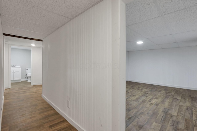 1617 Arlington Ave, Columbus, OH 43211 - corridor featuring wood finished floors, a paneled ceiling, baseboards, and recessed lighting