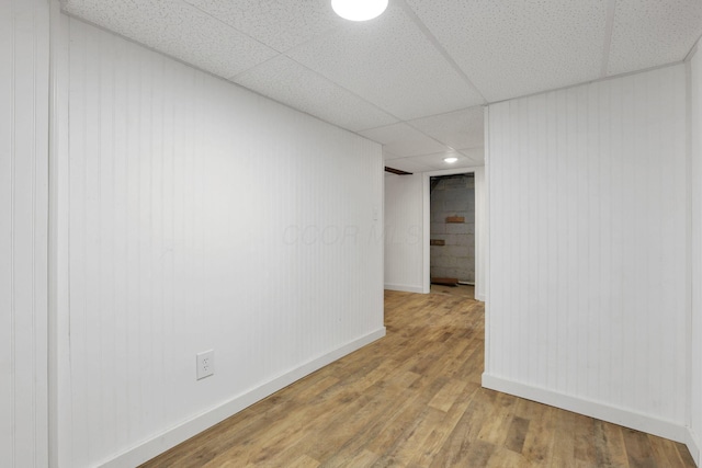 1617 Arlington Ave, Columbus, OH 43211 - spare room featuring wood finished floors, baseboards, and wood walls